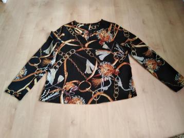 Zwart shirt/blouse met opdruk  beschikbaar voor biedingen