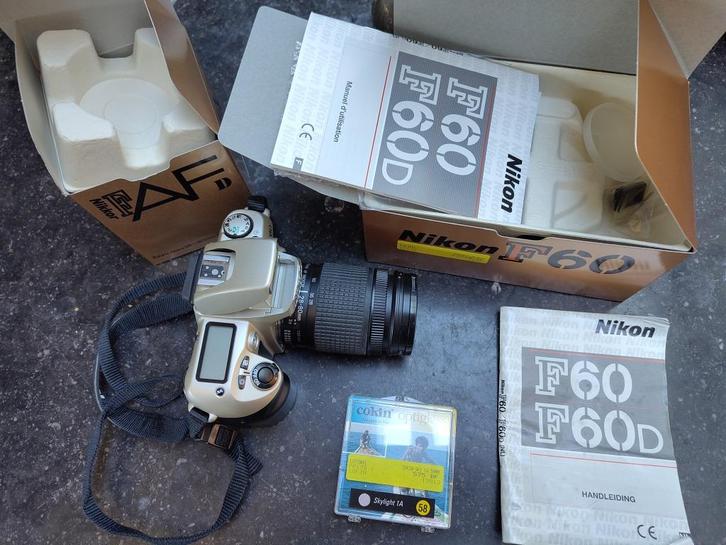 Nikon F60 spiegelreflexcamera + cokin sky 1A 58mm, Audio, Tv en Foto, Fotocamera's Analoog, Gebruikt, Spiegelreflex, Nikon, Ophalen of Verzenden