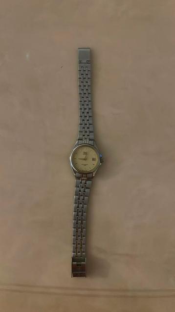 Q&Q horloge beschikbaar voor biedingen