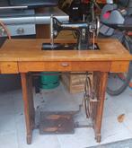 Neumann naaimachien, Ophalen