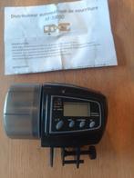 Distributeur de nourriture pour aquarium., Enlèvement, Utilisé