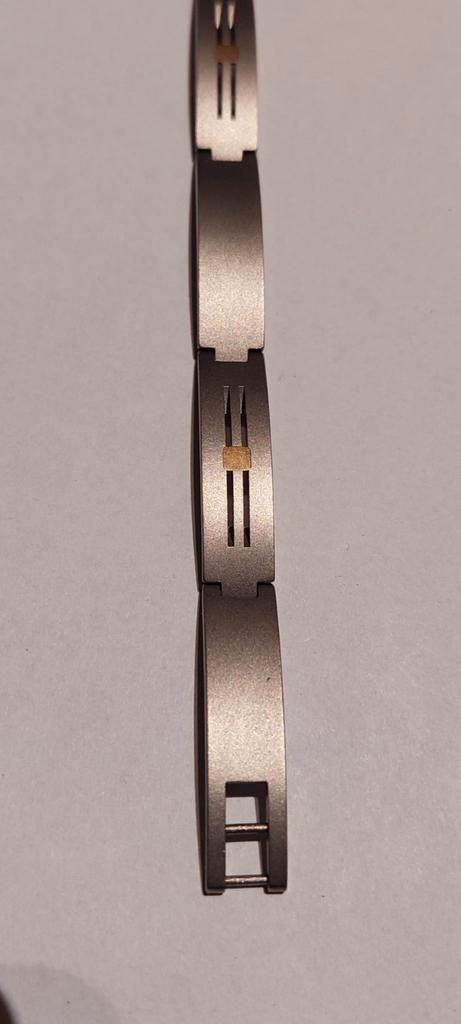 Armband titanium 14k goud., Handtassen en Accessoires, Armbanden, Nieuw, Overige materialen, Grijs, Verzenden