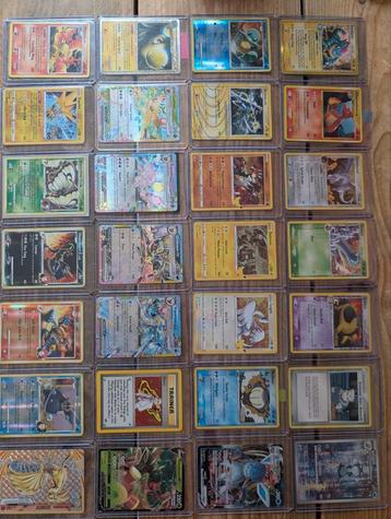 Holo's/ reverse Pokémon kaarten uit verschillende sets  beschikbaar voor biedingen