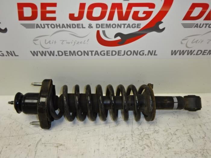 Schokdemperpoot rechts-achter van een Mitsubishi Outlander, Auto-onderdelen, Ophanging en Onderstel, Mitsubishi, Gebruikt, 3 maanden garantie