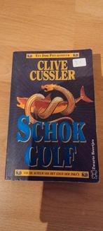 Clive Cussler - Schokgolf, Comme neuf, Clive Cussler, Enlèvement ou Envoi