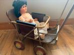 Oude poppenwagen en pop, Ophalen