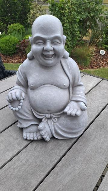 Lachende Buddha beschikbaar voor biedingen