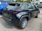 Toyota Yaris Cross Hybrid FWD DYNAMIC (bj 2023, automaat), Auto's, Stof, Gebruikt, Euro 6, Zwart