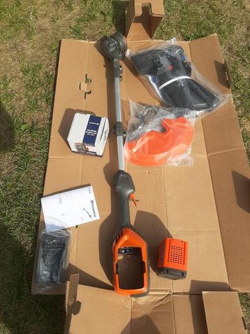 Husqvarna 215iL Accu Trimmer Bundel – Lichtgewicht, krachtig beschikbaar voor biedingen