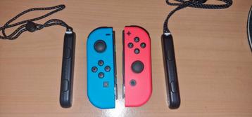 Nintendo Switch joycons rood en blauw origineel  beschikbaar voor biedingen