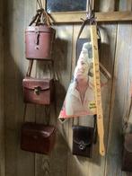 Vintage krantenstok, Ophalen