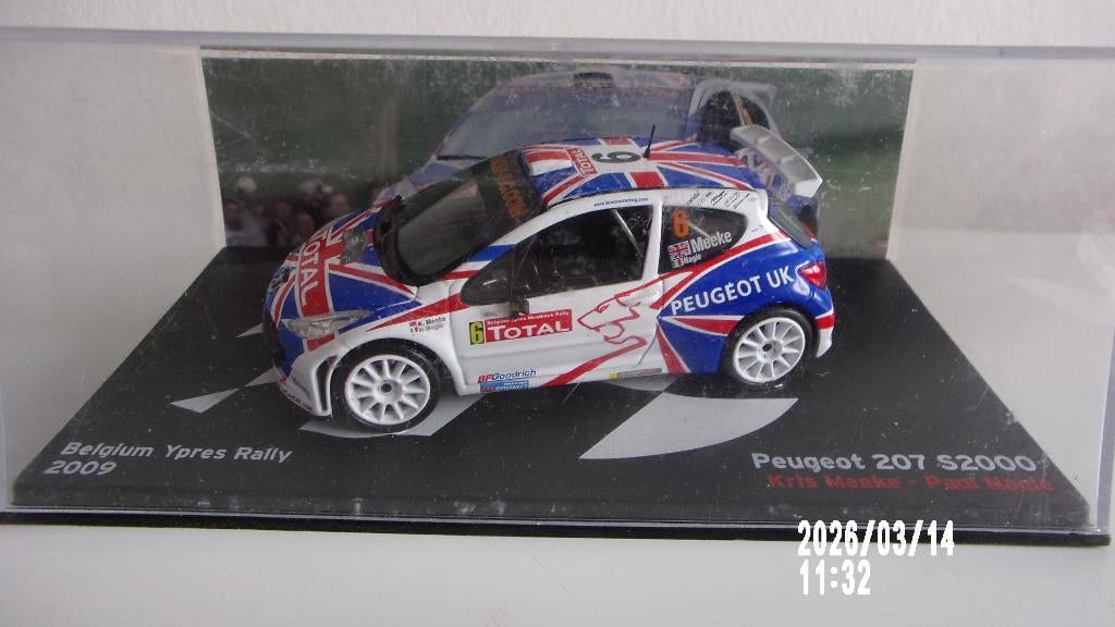 PEUGEOT 207 S2000 YPRES 2009,MEEKE.IXO 1/43 IMPEC en VITRINE, Ophalen of Verzenden, Zo goed als nieuw, Auto, Overige merken