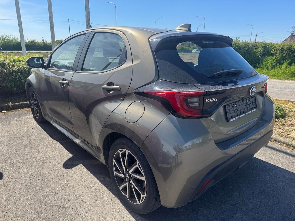 Toyota Yaris Iconic 1.5 hybrid nieuwstaat 28.000 km 11/23, Auto's, Toyota, Stof, 4 cilinders, 1490 cc, 5 zetels