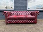 Prachtige Chesterfield zetel oxblood rood GRATIS GELEVERD, Huis en Inrichting, Zetels | Voetbanken en poefs, Leer, Ophalen of Verzenden