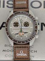 Swatch MoonSwatch Mission to Saturnus, Handtassen en Accessoires, Horloges | Heren, Overige materialen, Verzenden, Polshorloge