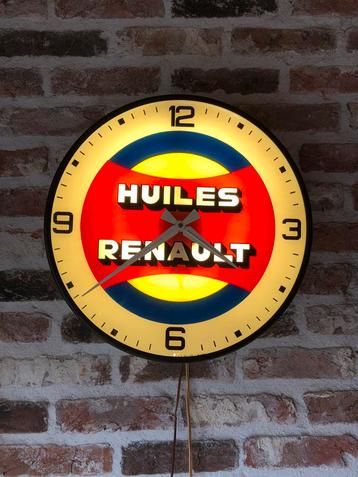 Oude glazen Renault Olie klok met verlichting beschikbaar voor biedingen