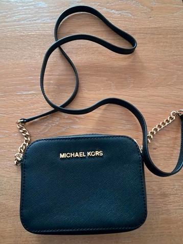 zwarte lederen kleine handtas met lange riem  beschikbaar voor biedingen