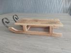 Houten slee decoratie, Ophalen