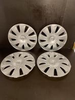 4 enjoliveurs Opel Astra 15", Comme neuf