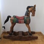 Houten schommelpaard, Ophalen