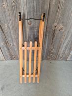 Houten slee, Enlèvement