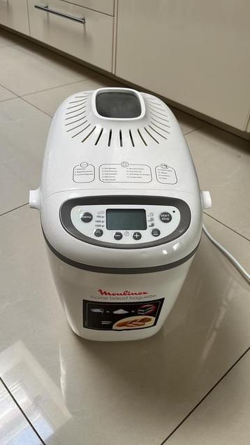 Broodbakmachine Moulinex met accessoire en bakboek beschikbaar voor biedingen