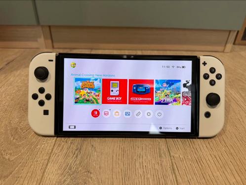 Nintendo switch OLED wit, Games en Spelcomputers, Spelcomputers | Nintendo Switch, Zo goed als nieuw, Switch OLED, Met 2 controllers