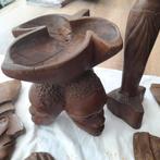 Verschillende houten beelden, Ophalen