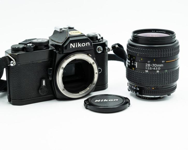 Nikon FM + Nikkor AF 28-70mm F3.5-4.5D + riem, Audio, Tv en Foto, Fotocamera's Analoog, Gebruikt, Spiegelreflex, Nikon, Ophalen of Verzenden