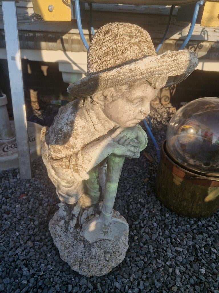 Cement kind met schop 70cm  €45, Ophalen