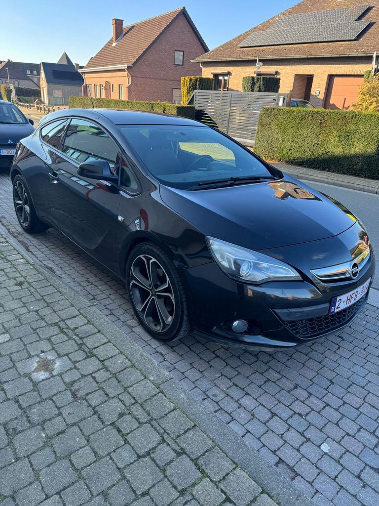 Opel Astra J GTC 2014, Auto's, Opel, Voorwielaandrijving, Euro 5, Zwart, Overige bekleding