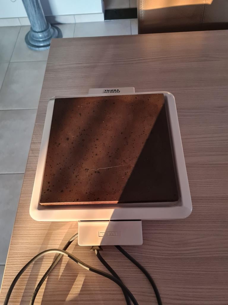 Tefal Pierrade Steengrill, Ophalen