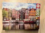 Puzzel Educa - 1000 stuks - Dansende huizen - Amsterdam, Enlèvement ou Envoi, 500 à 1500 pièces, Comme neuf, Puzzle