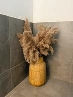 Vaas met Pampas pluimen, Enlèvement, Utilisé