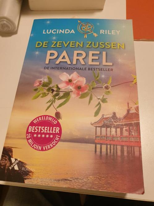 Lucinda Riley - Parel DEEL 4 vd zeven zussen 7e druk 2019, Boeken, Literatuur, Gelezen, Ophalen of Verzenden
