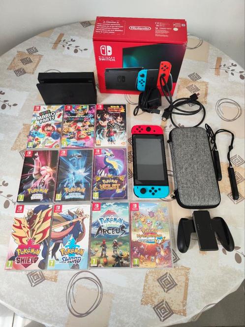 Nintendo switch V2 met games, Games en Spelcomputers, Spelcomputers | Nintendo Switch, Zo goed als nieuw, Met games, Ophalen of Verzenden