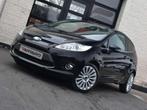 Ford Fiesta 1.25i Titanium Xenon / Airco / Garantie, Auto's, Voorwielaandrijving, Euro 5, Gebruikt, 4 cilinders