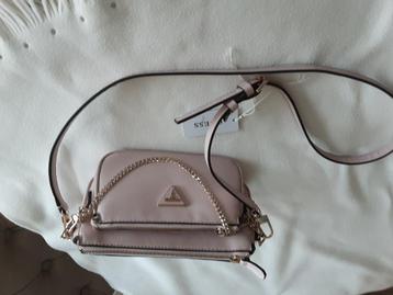 Guess licht rose schoudertas beschikbaar voor biedingen