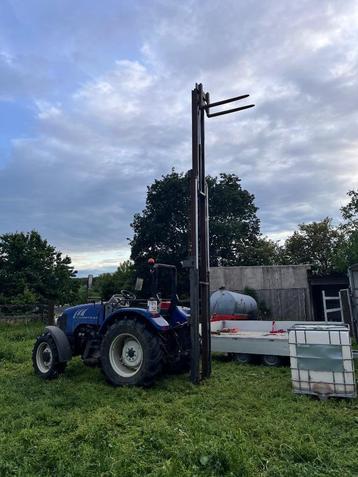 Zware hefmast voor tractor beschikbaar voor biedingen