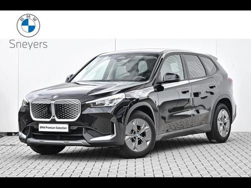BMW iX1 eDrive20, Auto's, BMW, X1, Airconditioning, Lederen bekleding, Lichtmetalen velgen, Metaalkleur, Radio, Zetelverwarming