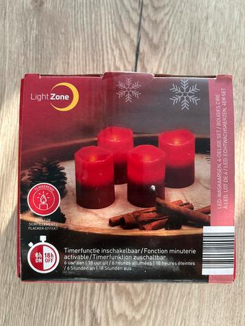 Ledkaarsjes rood en wit beschikbaar voor biedingen