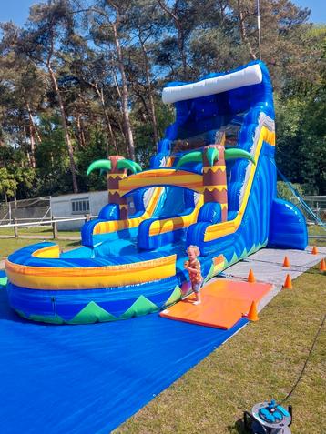 Beachslide waterspringkasteel met water-ballenbad te huur, Ophalen of Verzenden, Zo goed als nieuw
