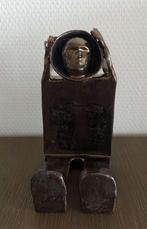 Beeldje in keramiek, Ophalen