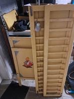 Houten babybedje, Ophalen