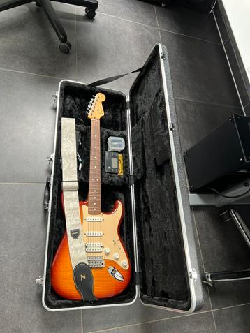 Fender Stratocaster MIM met accessoires en koffer disponible aux enchères