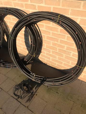 Proffesioneler druppelbuis met grondpluggen beschikbaar voor biedingen