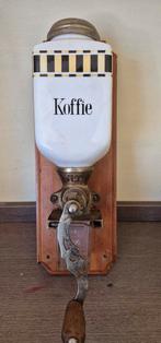 Antieke hang koffiemolen, Ophalen