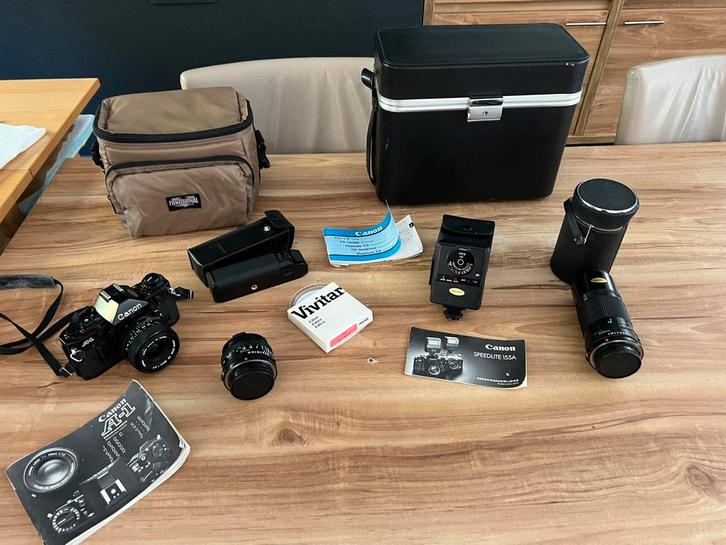 Canon A1 camera met lenzen ,speetlite , power winder A ,etui, Audio, Tv en Foto, Foto | Flitsers, Gebruikt, Canon, Ophalen
