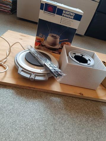 Fondue-apparaat  beschikbaar voor biedingen