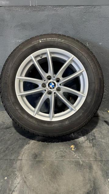 BMW X3 velgen met Bridgestone winter banden 18 inch beschikbaar voor biedingen